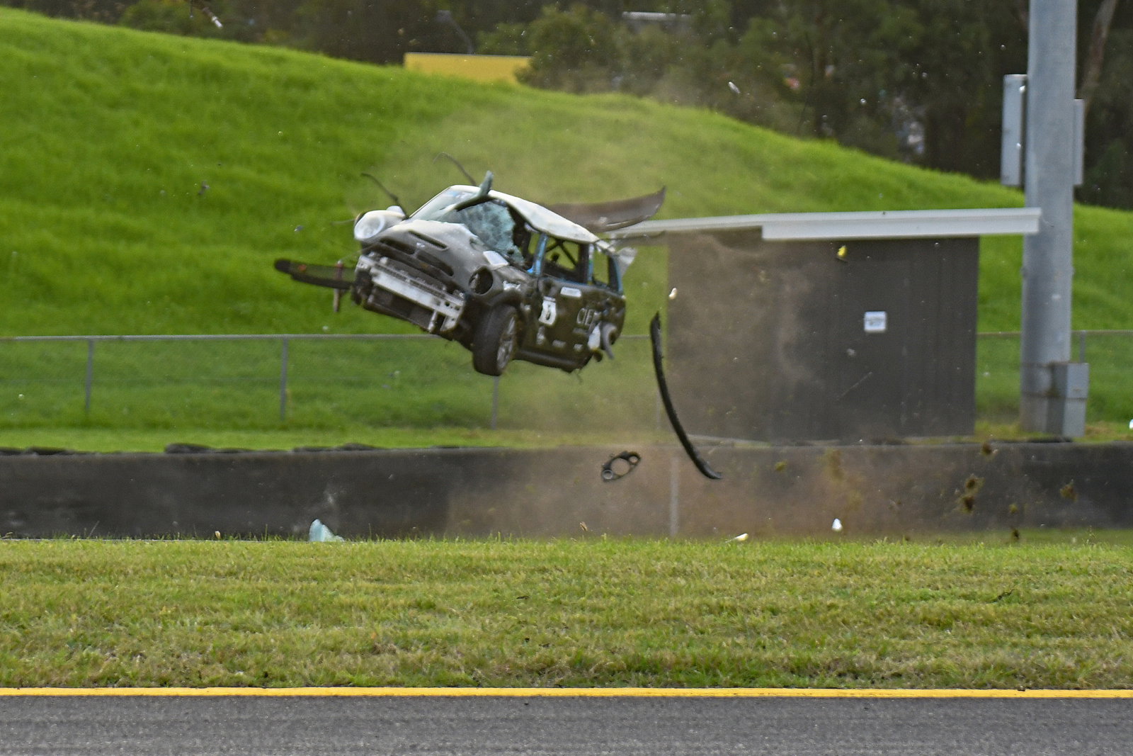Mini racer survives sickening Sydney rollover