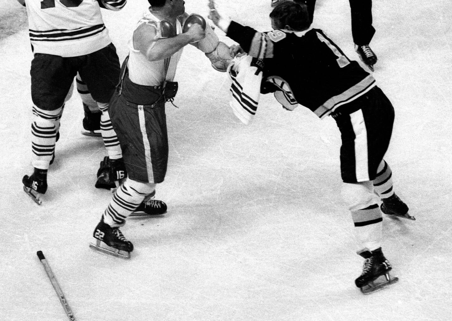 Forbes Kennedy (left) and John McKenzie duke it out in Kennedy's final NHL game.
