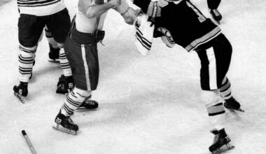 Forbes Kennedy (left) and John McKenzie duke it out in Kennedy's final NHL game.