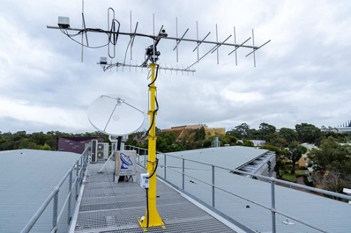 A radio antenna installed on a rooftop; it will be used in the IGNIS project