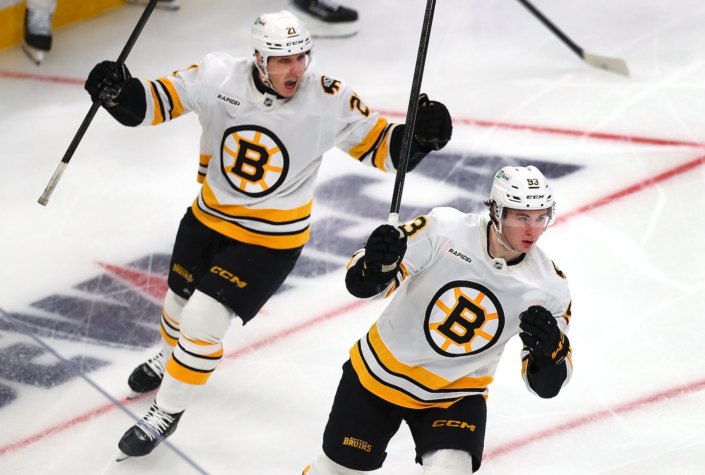 Alex Steeves (left) scored nine goals to go with seven assists in 43 games, and often skated with another recent Bruins acquisition in Fraser Minten.