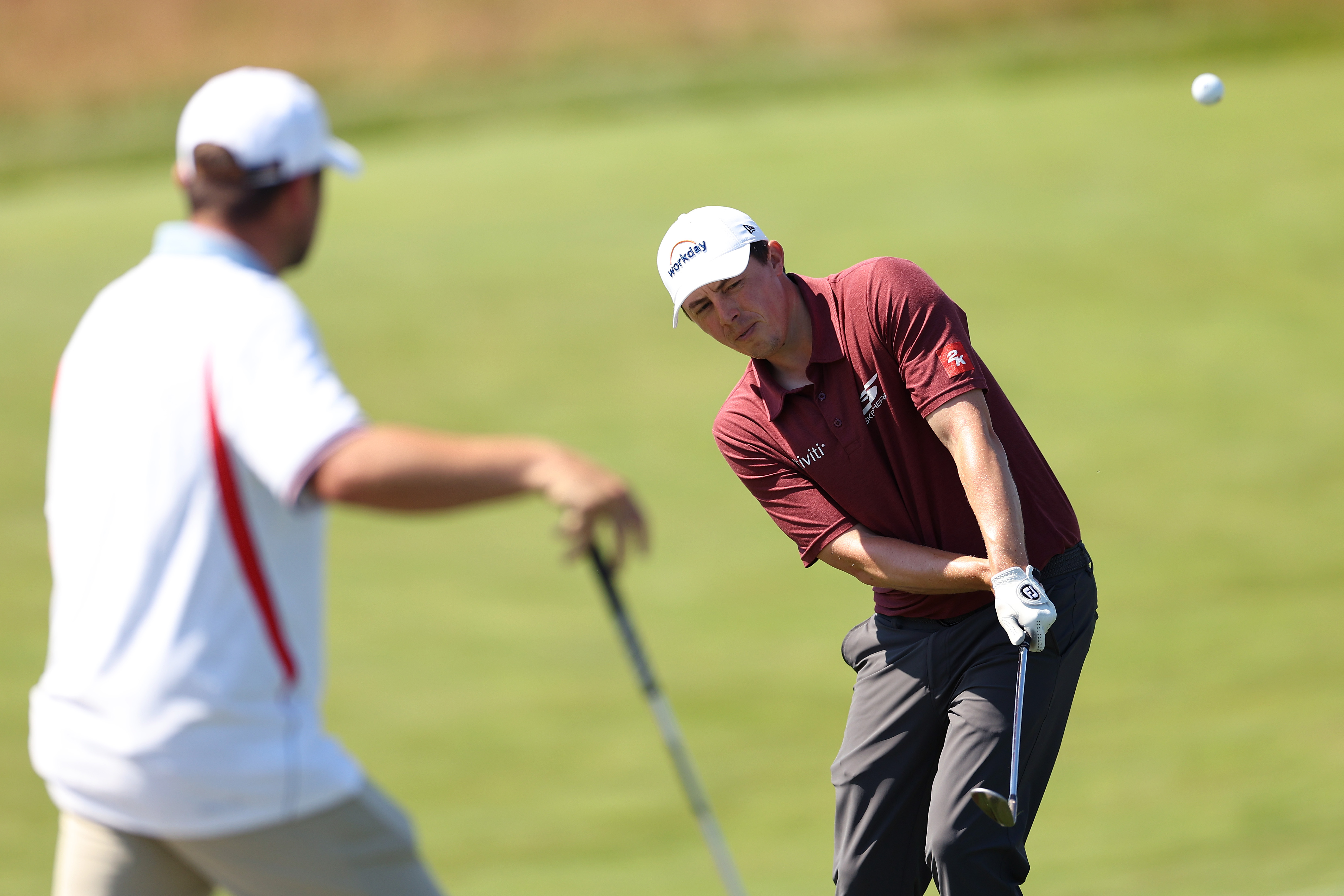 Matt Fitzpatrick plays a cross-handed chip shot on the 11th hole during a practice round prior to the 126th U.S. OPEN at Shinnecock Hills Golf Club (Photo by Mike Mulholland/Getty Images)