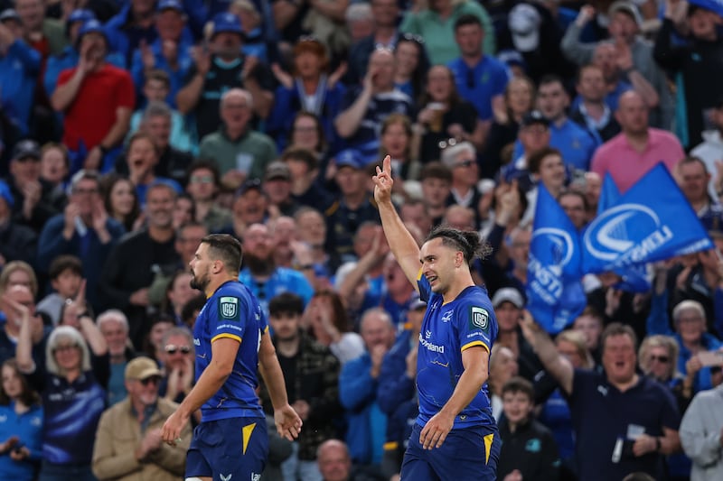 James Lowe acknowledges the crowd after his try against the Lions in the URC quarter-final saw him become Leinster's all-time leading try scorer. Photograph: Ben Brady/Inpho