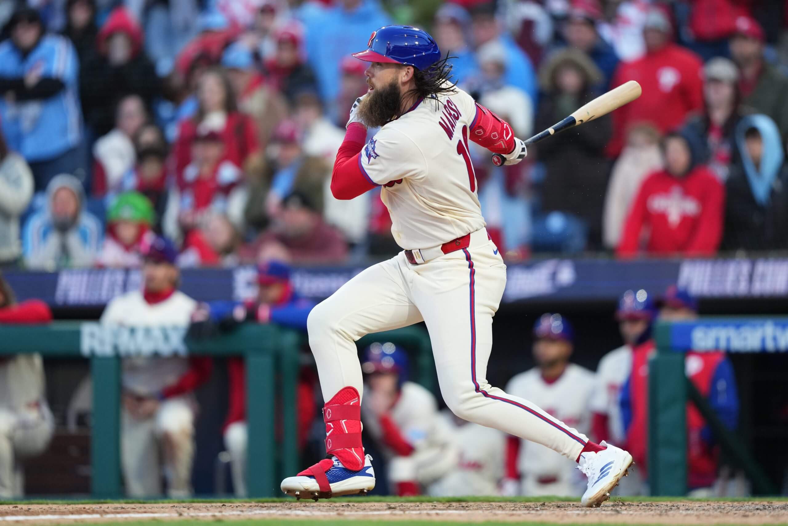 Philadelphia Phillies outfielder Brandon Marsh (16) hits an RBI single against the Texas Rangers in the ninth inning at Citizens Bank Park.