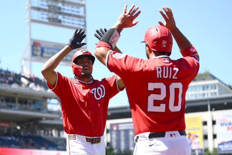 Washington Nationals' James Wood, left, celebrates after his two-run home run with Keibert Ruiz (20) during the fifth inning of a baseball game against the San Diego Padres, Sunday, May 31, 2026, in Washington.