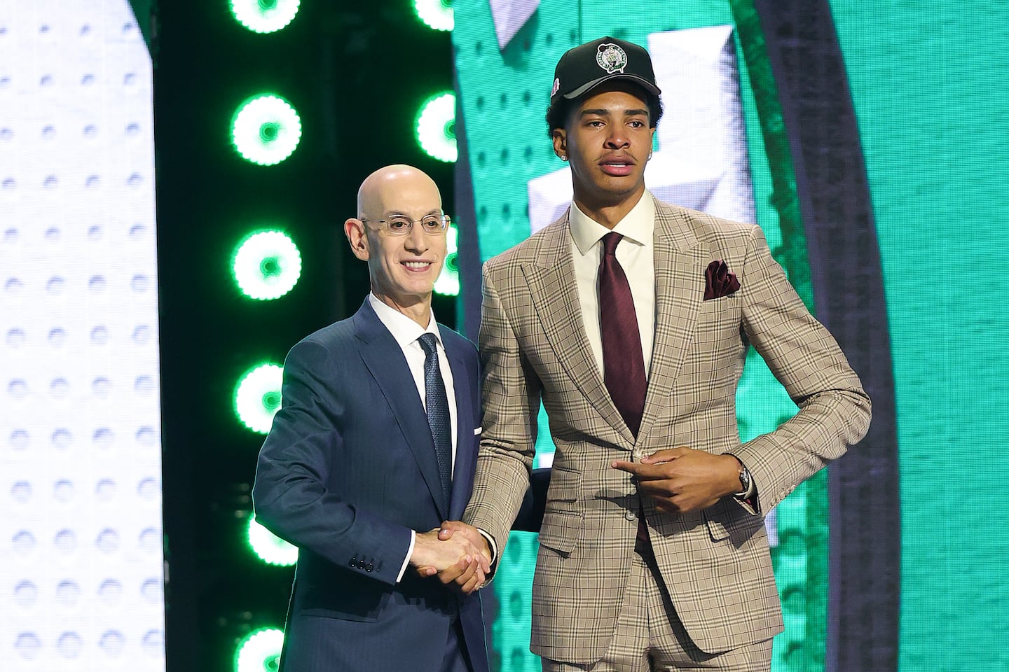NBA commissioner Adam Silver shakes hands with Chris Cenac Jr. after he is drafted by the Celtics No. 27 overall in the first round of the NBA Draft Tuesday night at Barclays Center in Brooklyn.