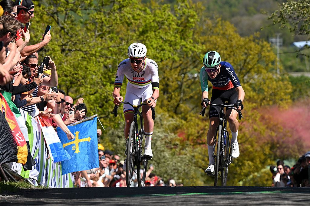 Tadej Pogacar and Paul Seixas of France and Team Decathlon CMA CGM compete in the breakaway climbing the Cote de la Redoute (292m) during the 112th Liege - Bastogne - Liege 2026