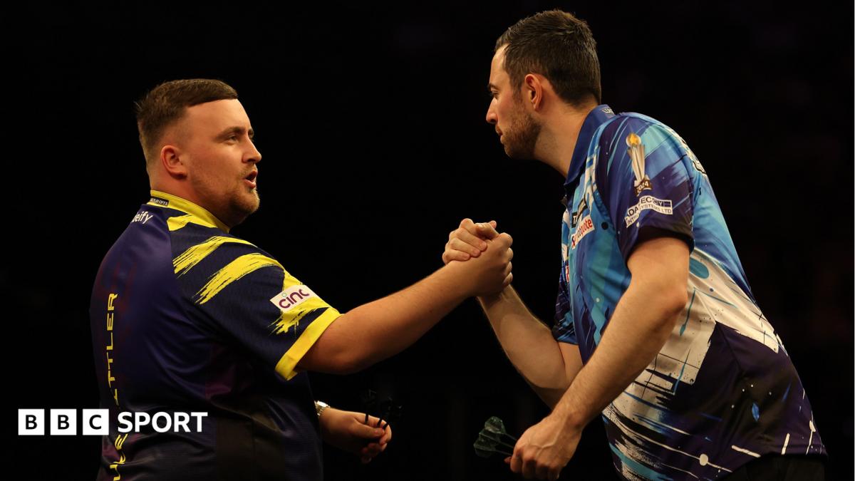 Luke Littler shakes hands with Luke Humphries at the Premier League Darts finals
