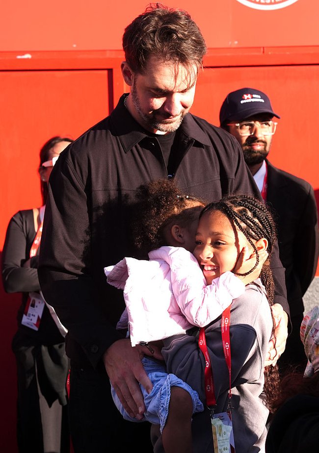 Williams’ husband Alexis Ohanian and her children watch on at Queen’s.