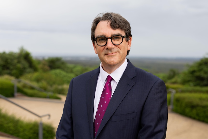 Man in suit looking at camera