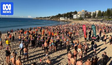 Community reeling from shark attack returns to Coogee Beach for swim-out supporting local mother