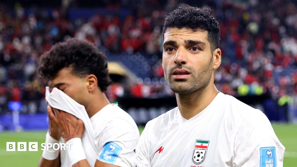 Ramin Rezaeian and Mehdi Taremi of Iran deflated after draw with Egypt at 2026 World Cup