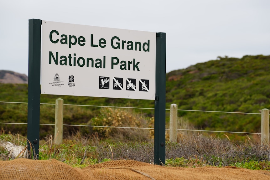 a sign on a beach that says 'cape le grand national park'