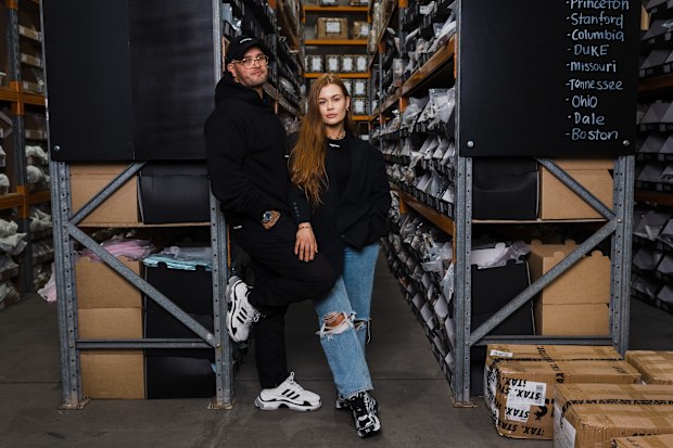 STAX activewear brand founders Don Robertson and partner Matilda Murray at their design warehouse in Banksmeadow, Sydney, Thursday 14 July, 2022.