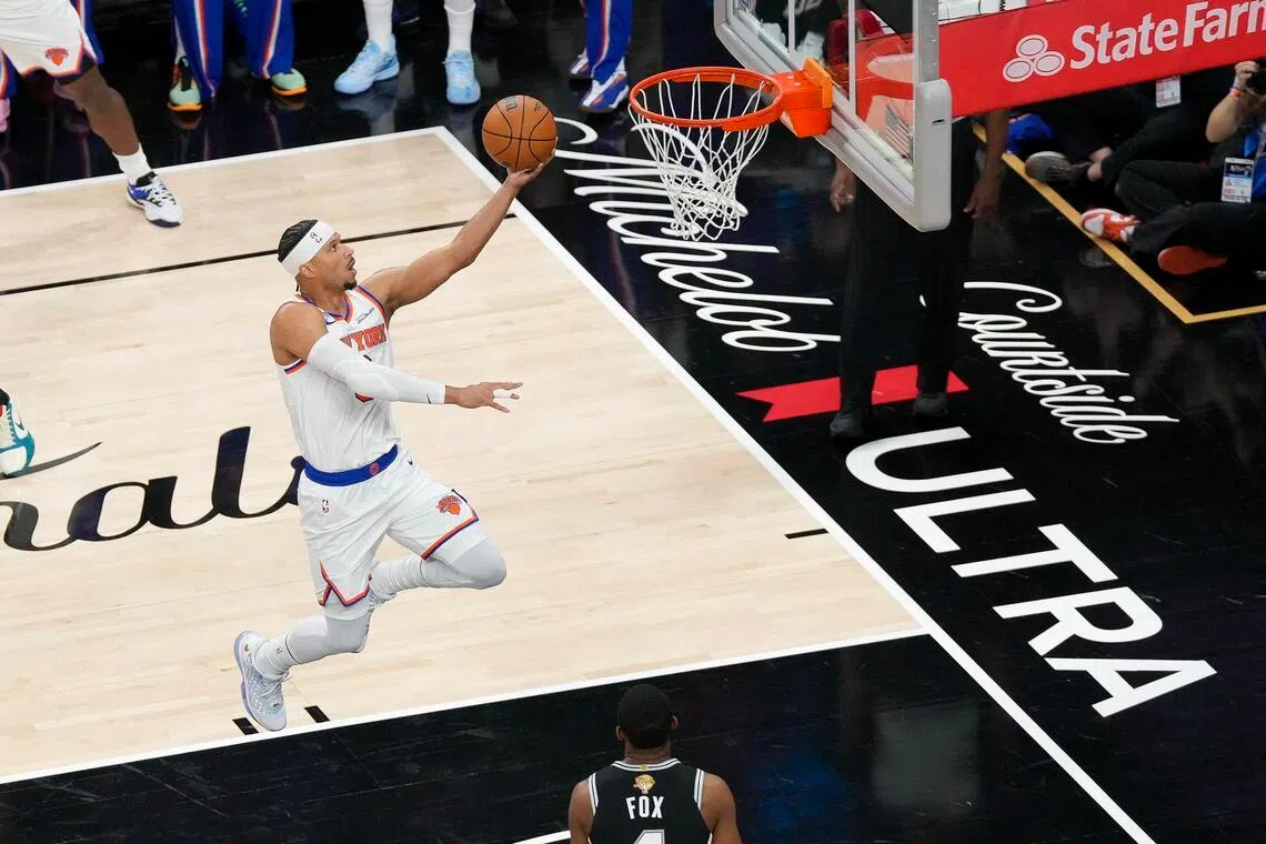 New York Knicks guard Josh Hart makes a layup against the San Antonio Spurs during Game 1 of the NBA Finals.