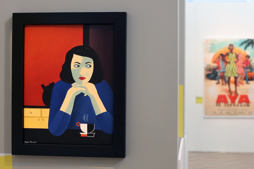 A painting showing a young woman side-eyeing out of frame while nursing a coffee is displayed on a gallery wall.