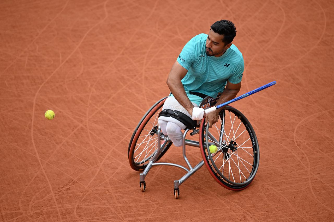 Ahmet Kaplan of Turkiye in action against Niels Vink (not seen) of the Netherlands during the Quad Wheelchair Singles Final the 2026 French Open at Roland Garros on June 6, 2026 in Paris, France. (AA Photo)