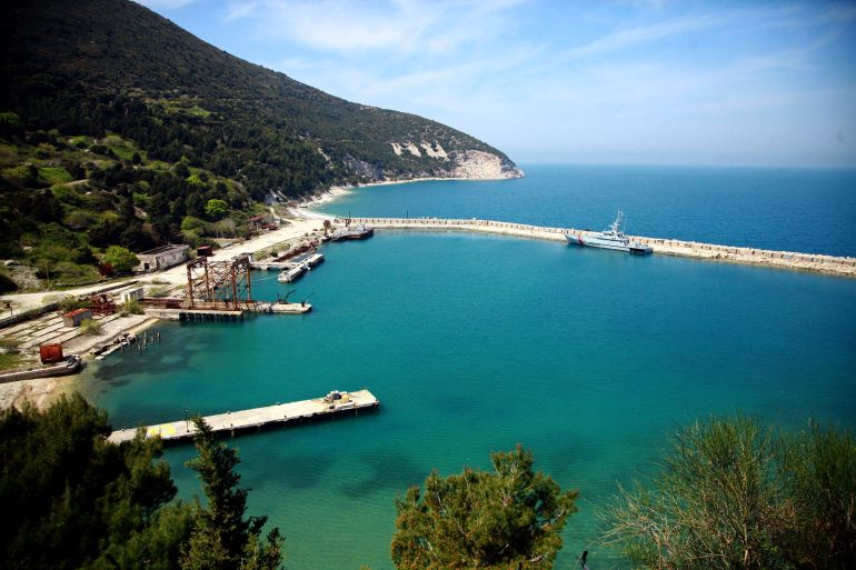 This April 14, 2015 photo shows a view of the small harbor on Sazan Island, 140 kilometers (85 miles) southwest of Albania's capital Tirana. The government plans to change the island, a former military area for decades, into an attraction, to boost tourism in the country. (AP Photo/Hektor Pustina)