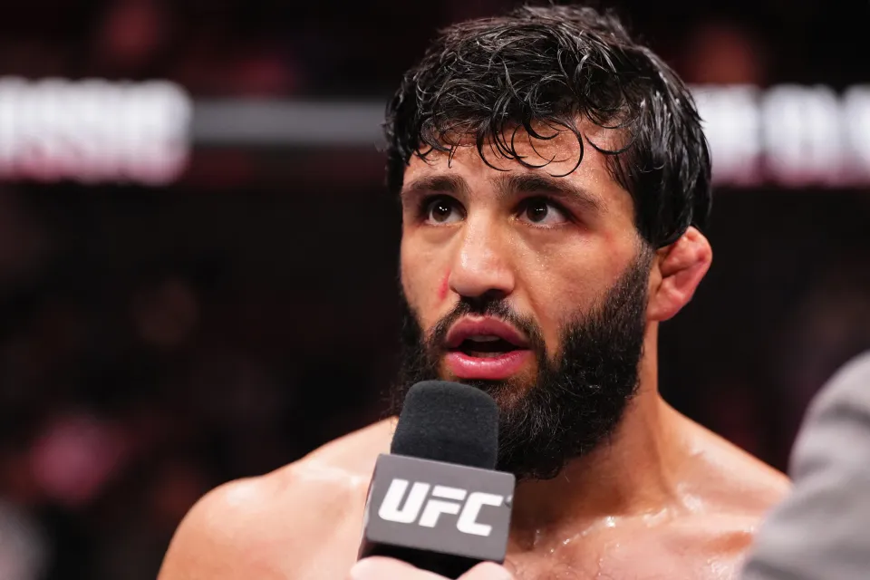 Arman Tsarukyan of Georgia reacts after a submission victory against Dan Hooker of New Zealand in a lightweight fight during the UFC Fight Night event at ABHA Arena on November 22, 2025 in Doha, Qatar.