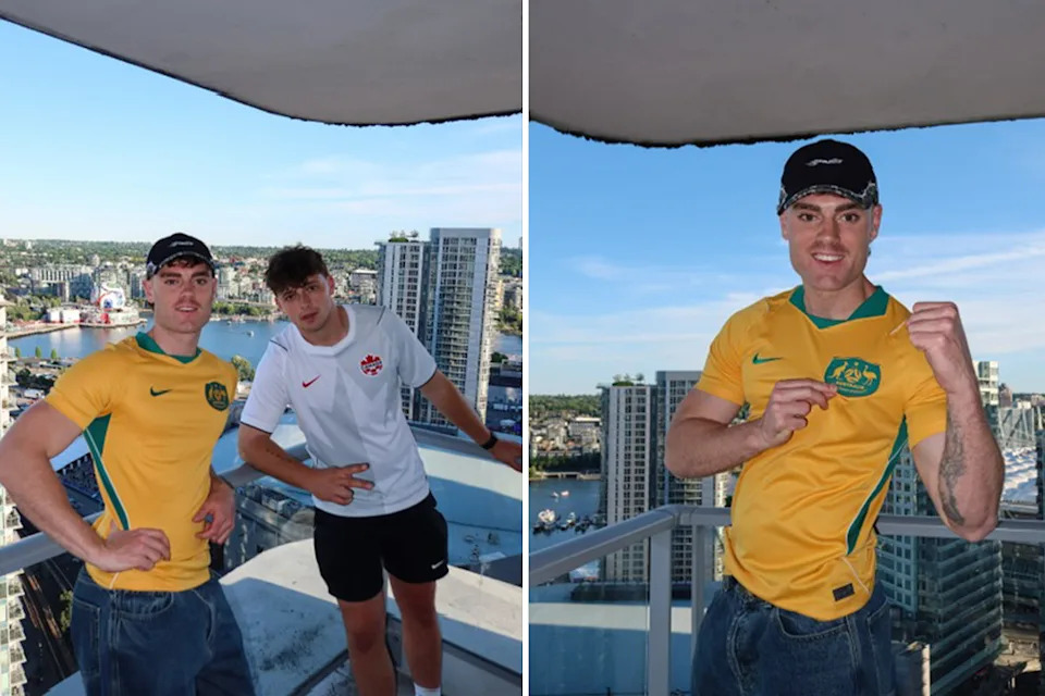 Lachy and his mate on a balcony.