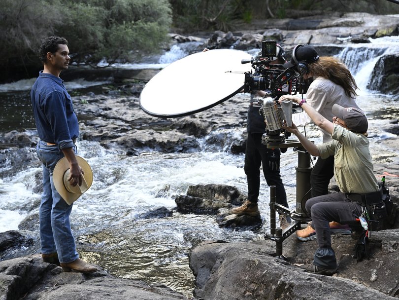 Mark Coles Smith as Jay Swan, Director of Photography Sky Davies, Best Boy Thomas Arnott and standby props Olivia Beaumont on location in Pemberton for Mystery Road: Origin.