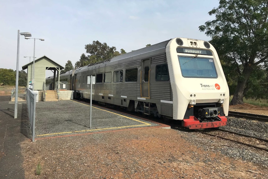 A train sitting stationary on tracks