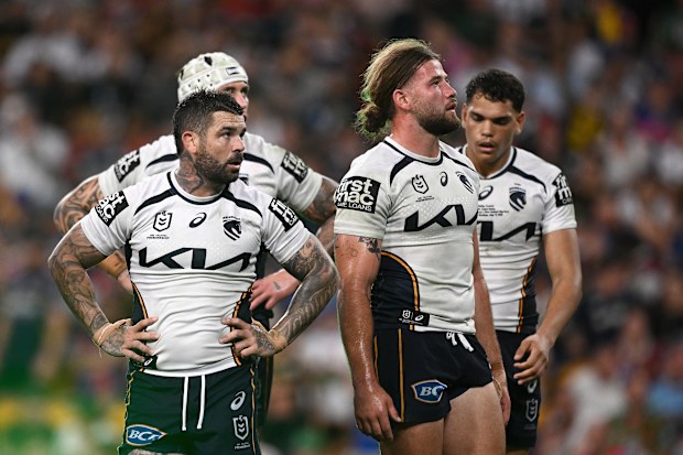Broncos players Adam Reynolds and Patrick Carrigan react during a loss to the Warriors.