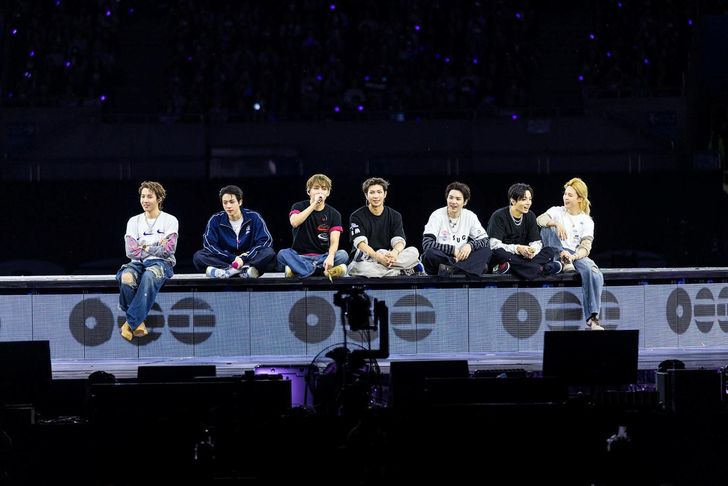 Members of K-pop boy band BTS address the crowd during their ongoing 'ARIRANG' World Tour at Busan's Asiad Main Stadium, Saturday. Courtesy of BigHit Music