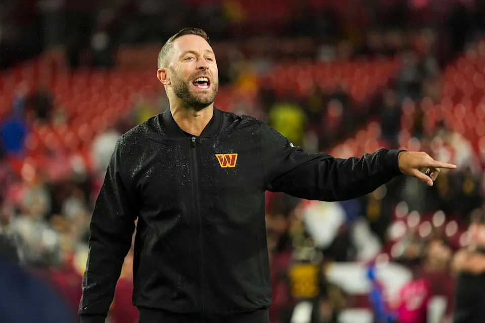 LANDOVER, MARYLAND - OCTOBER 13: Washington Commanders Kliff Kingsbury looks on from the field during warmups prior to an NFL football game against the Chicago Bears at Northwest Stadium on October 13, 2025 in Landover, Maryland. (Photo by Perry Knotts/Getty Images)