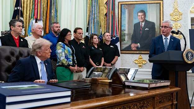Greg Foran (far right), chief executive officer of Kroger, speaks during an announcement in the Oval Office of the White House in Washington last month.