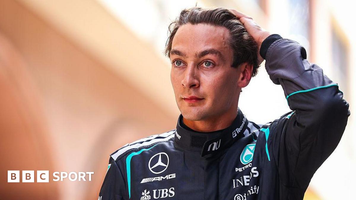 George Russell runs his hand through his hair and looks disappointed following Monaco Grand Prix qualifying