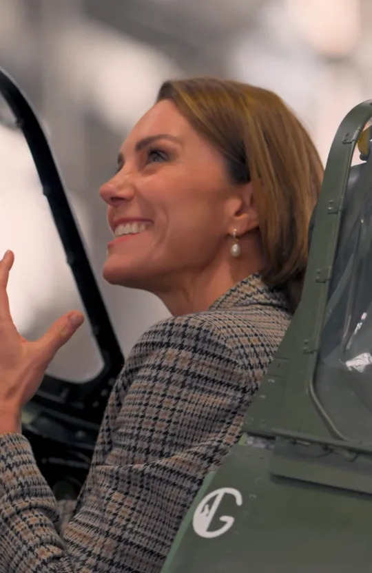Kate and George took turns sitting in the cockpit of various historic military aircraft during the trip