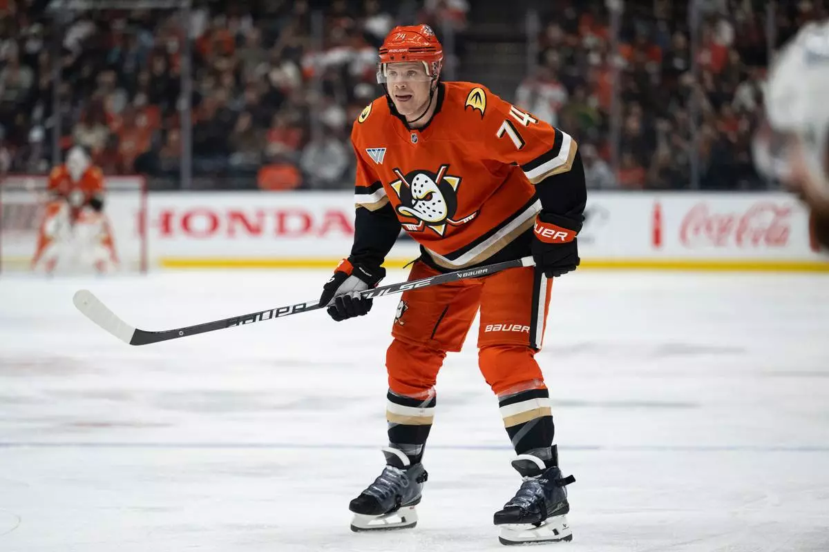 FILE - Anaheim Ducks defenseman John Carlson takes his stance during an NHL hockey game against the Vancouver Canucks, April 12, 2026, in Anaheim, Calif. (AP Photo/Kyusung Gong, File)