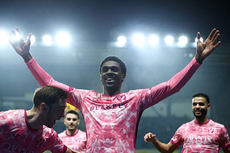 Mohamed Toure of Norwich City celebrates after scoring a goal for Norwich City
