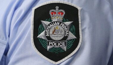 Queensland man charged after allegedly sending threatening emails, voice messages to federal politician