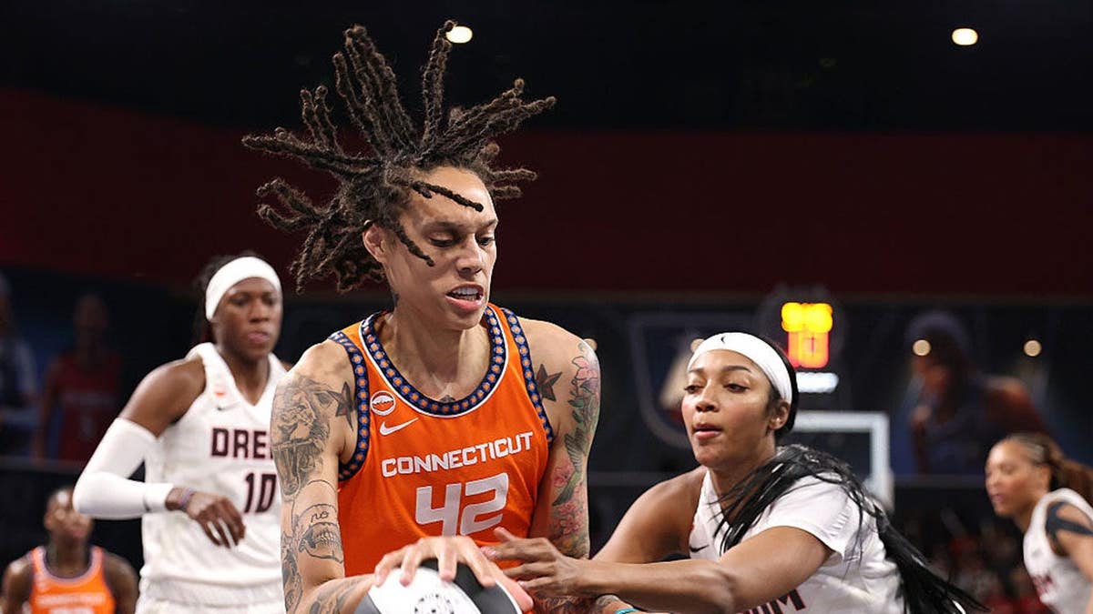 Brittney Griner driving against Angel Reese during a basketball game at Gateway Center Arena.