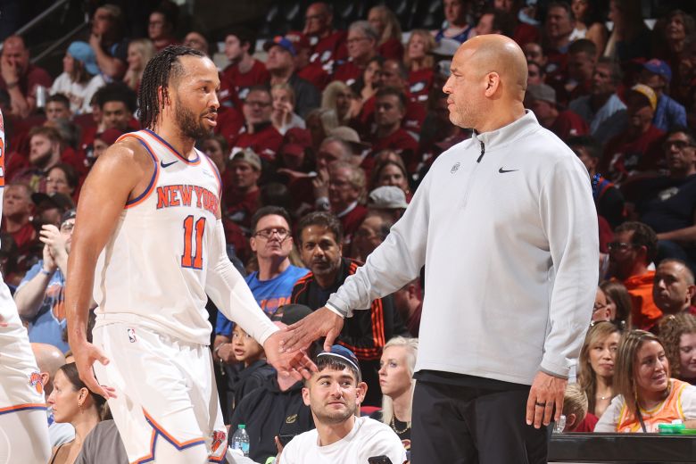 Assistant Coach Rick Brunson and his son Jalen Brunson #11 of the New York Knicks during game against the Cleveland Cavaliers in the 2026 Eastern Conference Finals on May 25, at Rocket Arena in Cleveland, Ohio.