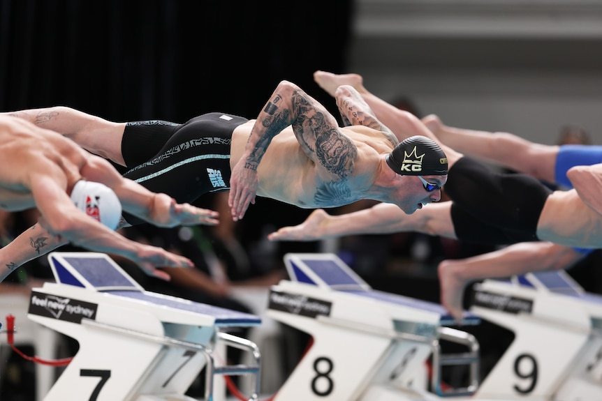 Kyle Chalmers dives into the water to start a race at the Australian Swimming Trials.