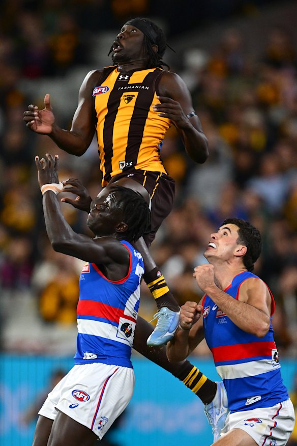 Hawthorn’s Mabior Chol flies high for a mark on Friday night.
