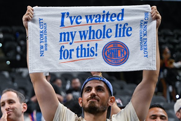 Knicks fans show their elation.