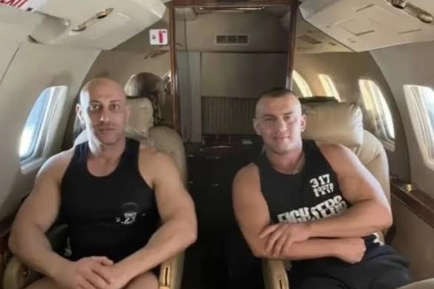 Tarek Zahed and Salim Aschna wear black singlets and are pictured onboard a private jet.