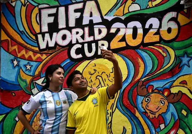 Fifa World Cup mural with a Brazil and Argentina supporter