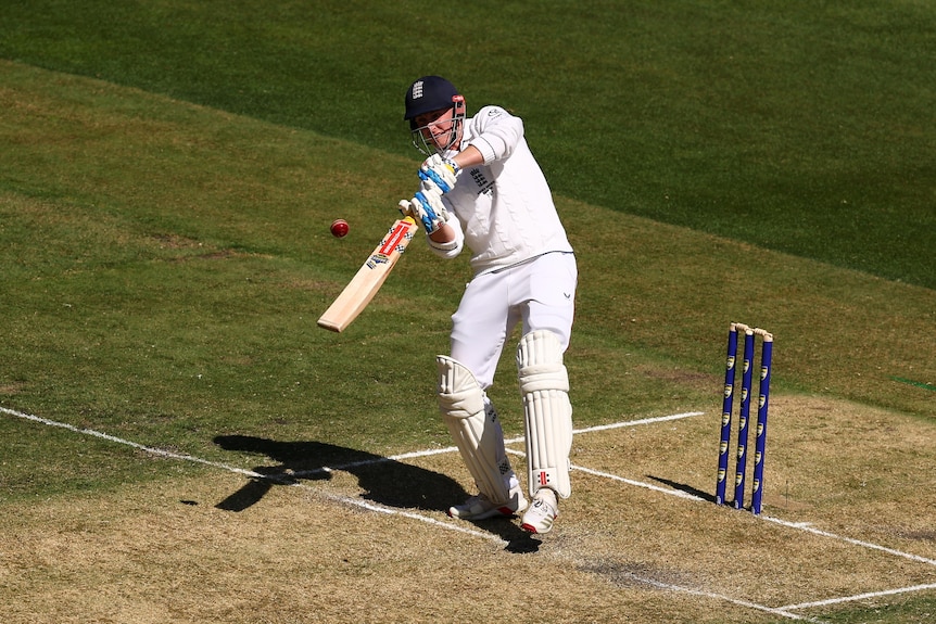 England batter Harry Brook tries to hit a ball over his shoulder during a Test match.