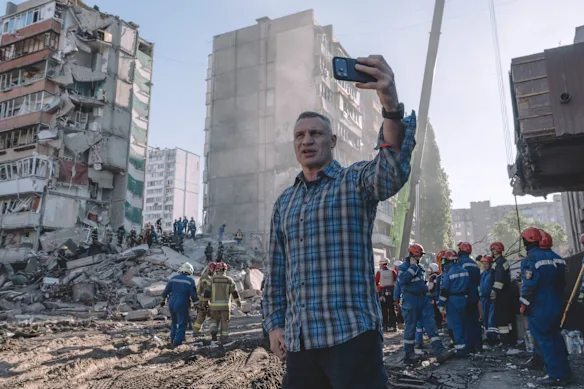 Kyiv Mayor Vitali Klitschko visits the site of a Russian air strike on the city in May.