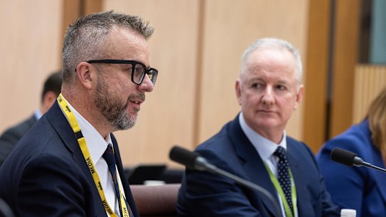 Justin Stevens (left) and ABC managing director Hugh Marks at a Senate estimates hearing in December.