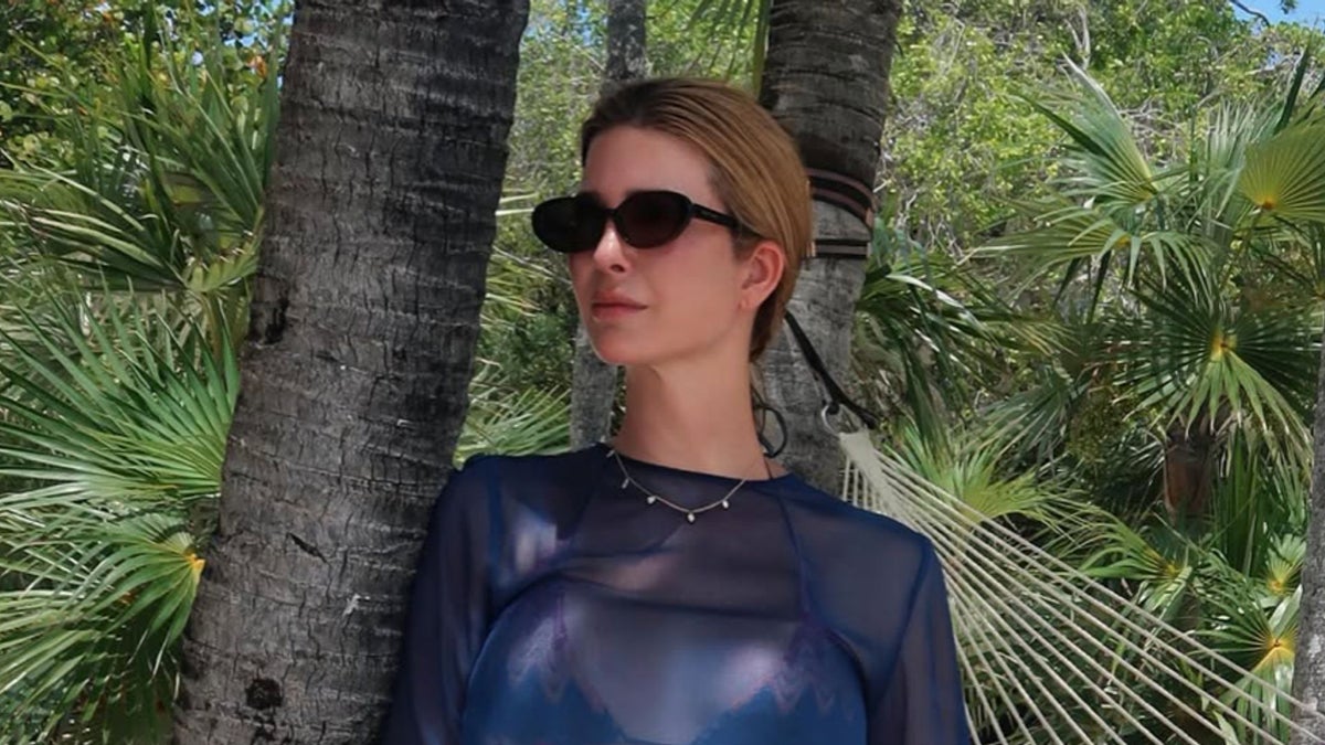 Ivanka Trump turns heads in strapless red dress and daring sheer beach look in new beachside photos