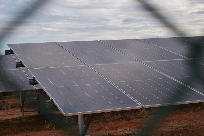 Solar panel mounted above the ground in the outback
