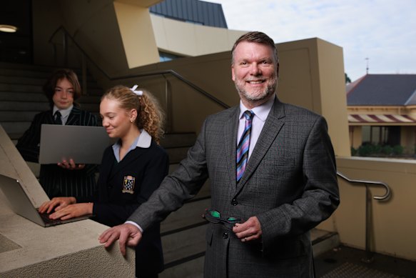St Leonard’s College director of innovation Charles Neave, with Year 8 Lewis Goddard and Year 10 Isabelle Skewes.