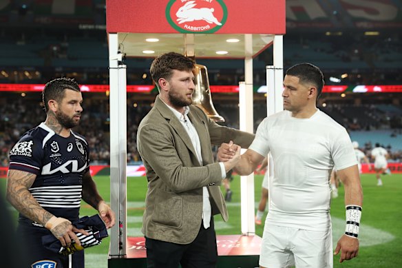 Jai Arrow with Cody Walker (right) and Adam Reynolds before kick-off.