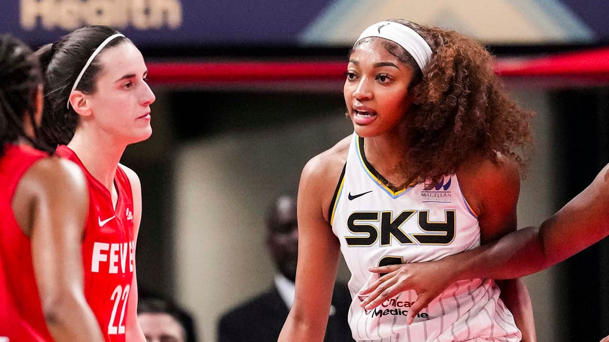 Chicago Sky forward Angel Reese reacting to a flagrant foul by Indiana Fever guard Caitlin Clark during a basketball game